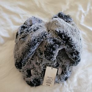 Black Stars Above Fuzzy Slippers